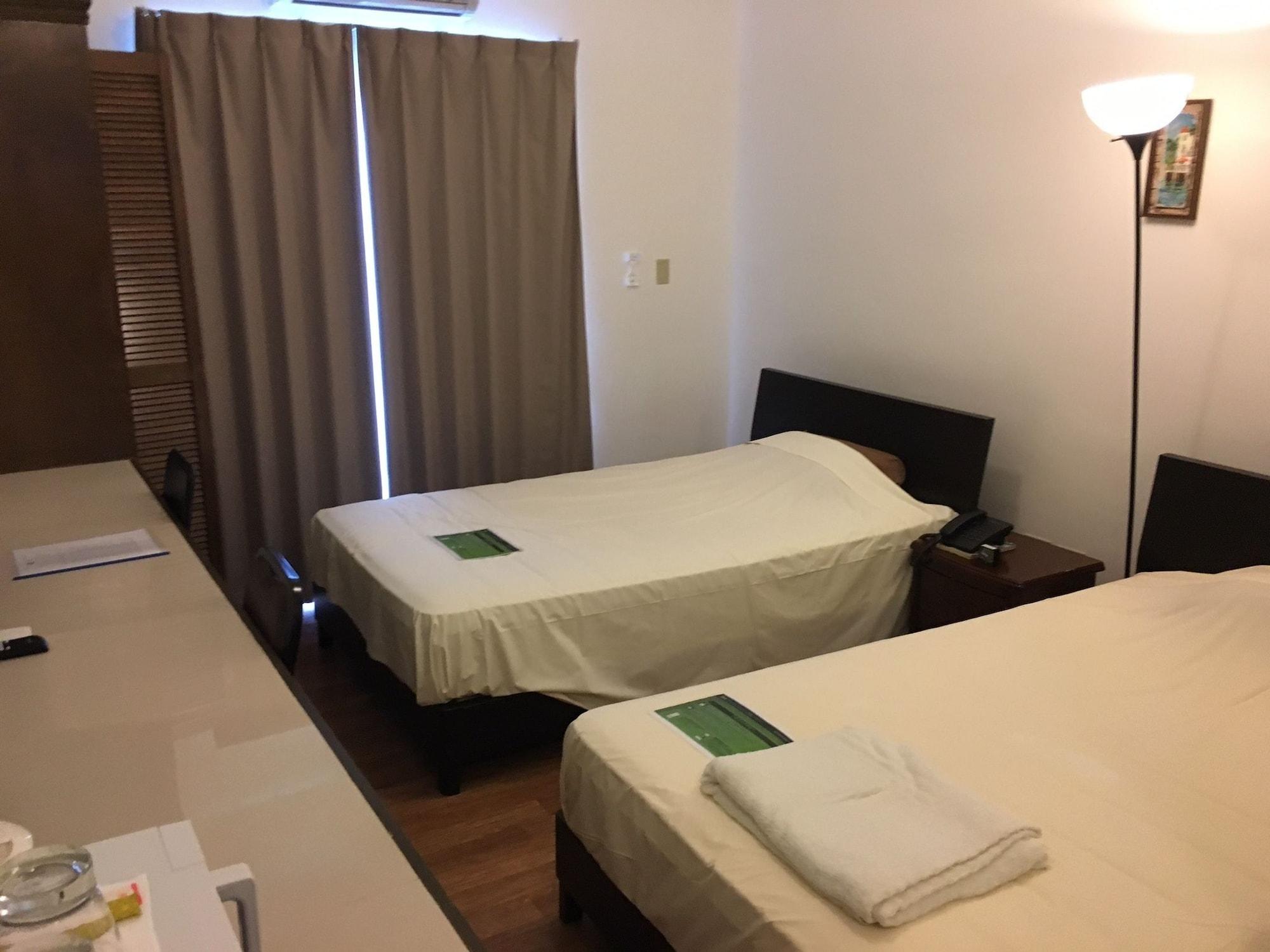 Himawari Hotel Garapan Buitenkant foto