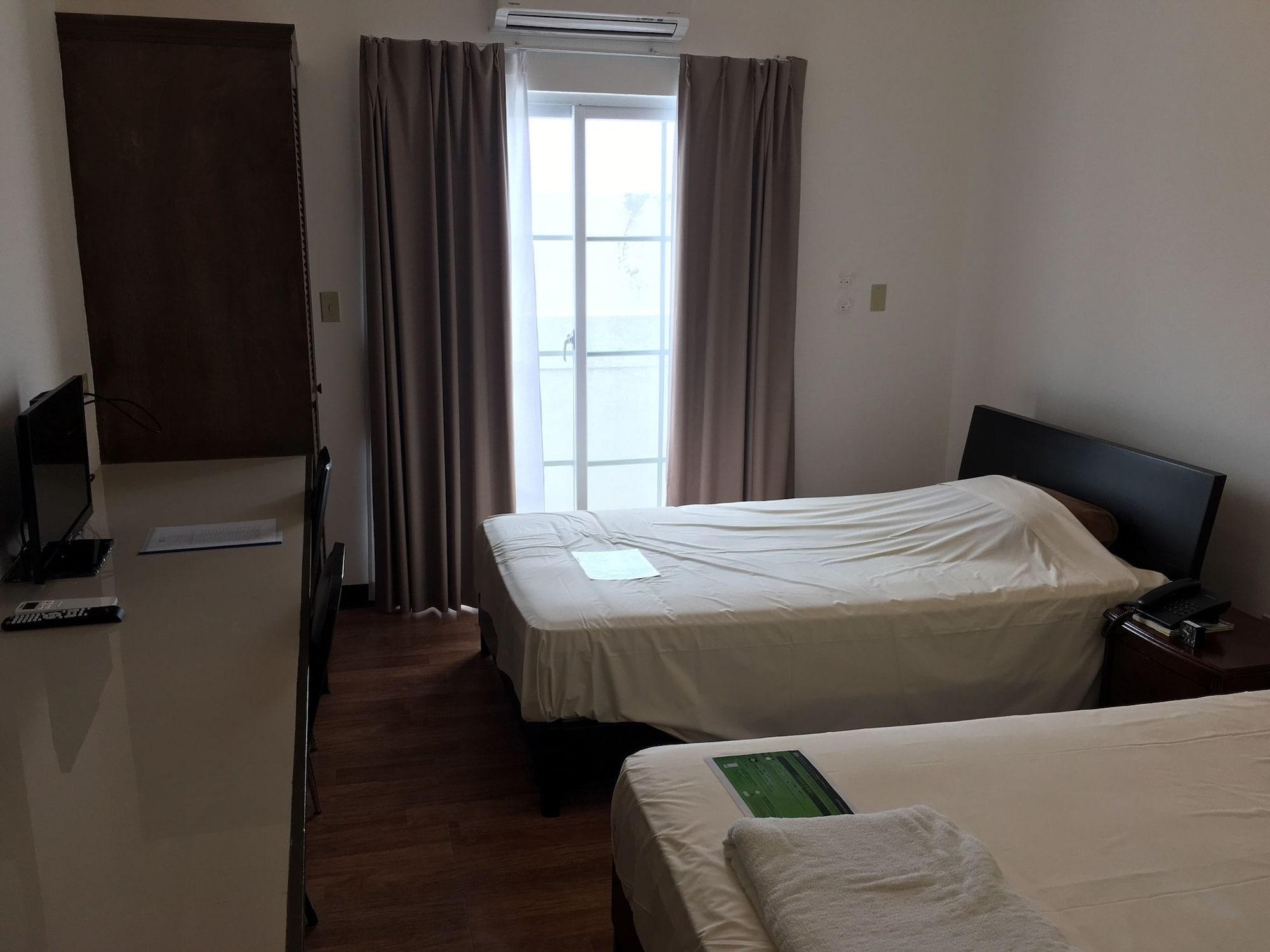 Himawari Hotel Garapan Buitenkant foto